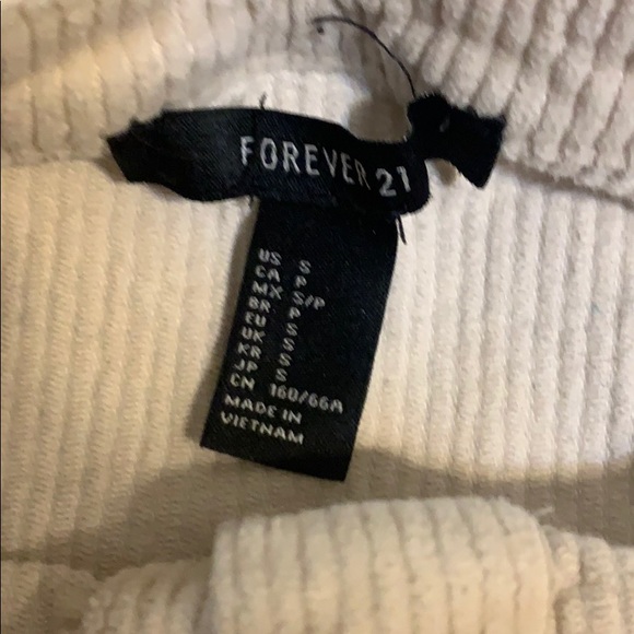 Tan button down skirt. Decently stretchy material - Picture 3 of 3